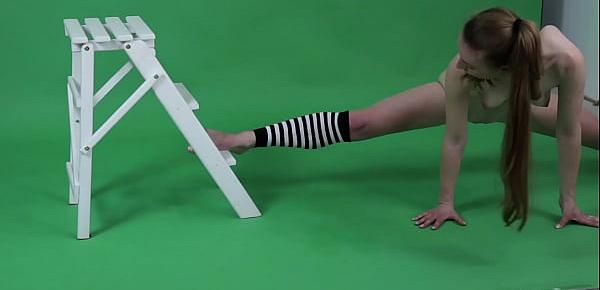  Young brunette gymnast Anna Mostik spreading legs